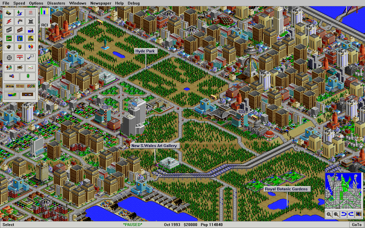 Libreopolis rendering the built-in city of Sydney: a dense isometric downtown with parks, rail and a harbour, the toolbar, menus and a minimap around it.